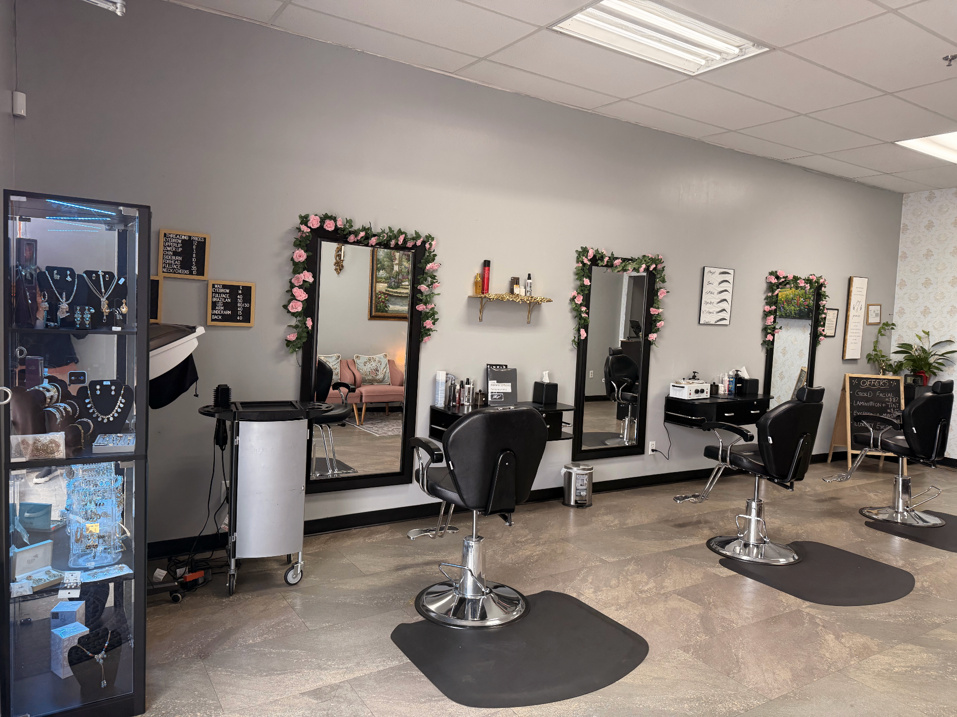 Styling stations with floral mirrors at brows n beauty studio in Stockton